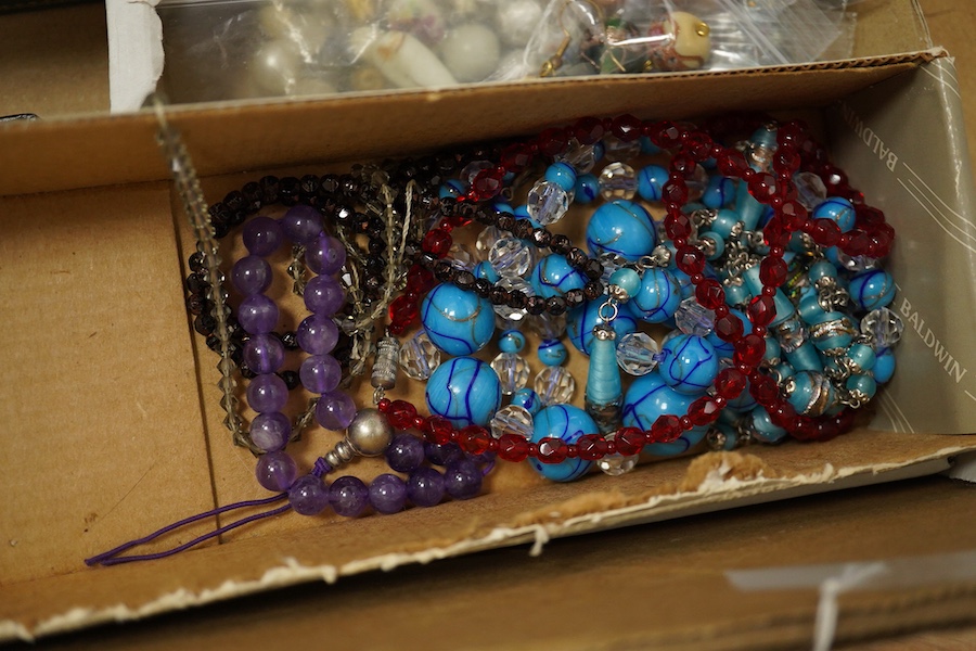 A quantity of assorted costume and and other jewellery including amethyst beads, malachite beads, tiger's eye quartz pendant, unmounted shell cameos, etc. Condition - poor to fair to good